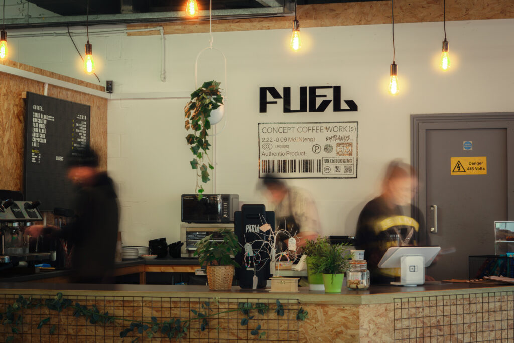 Hustling kitchen staff at Fuel Coffee Shop during morning service.